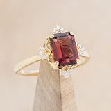 "TREVA" - EMERALD CUT MOZAMBIQUE GARNET ENGAGEMENT RING WITH DIAMOND ACCENTS