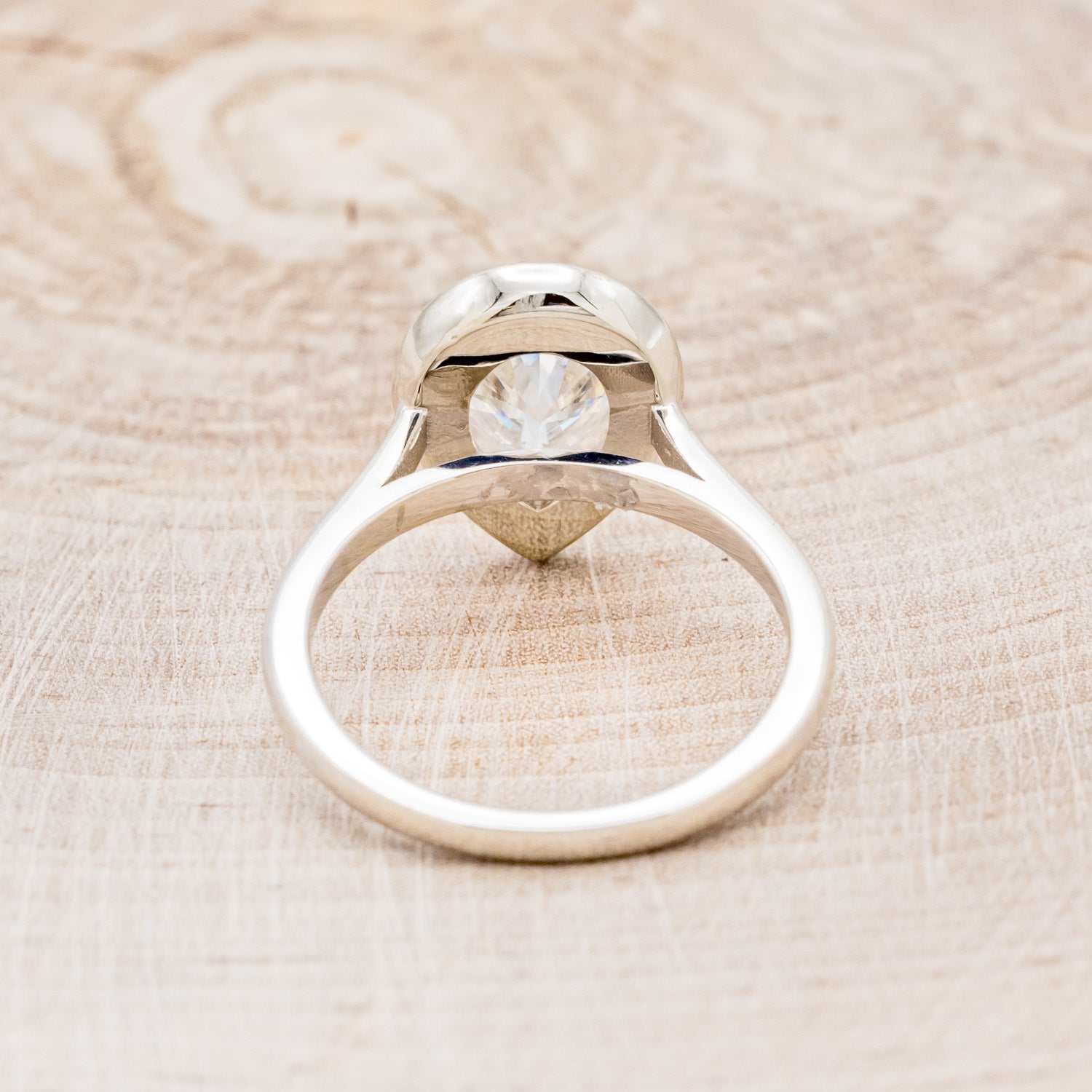 "ARABELLA" - PEAR-SHAPED MOISSANITE ENGAGEMENT RING WITH DIAMOND HALO-11