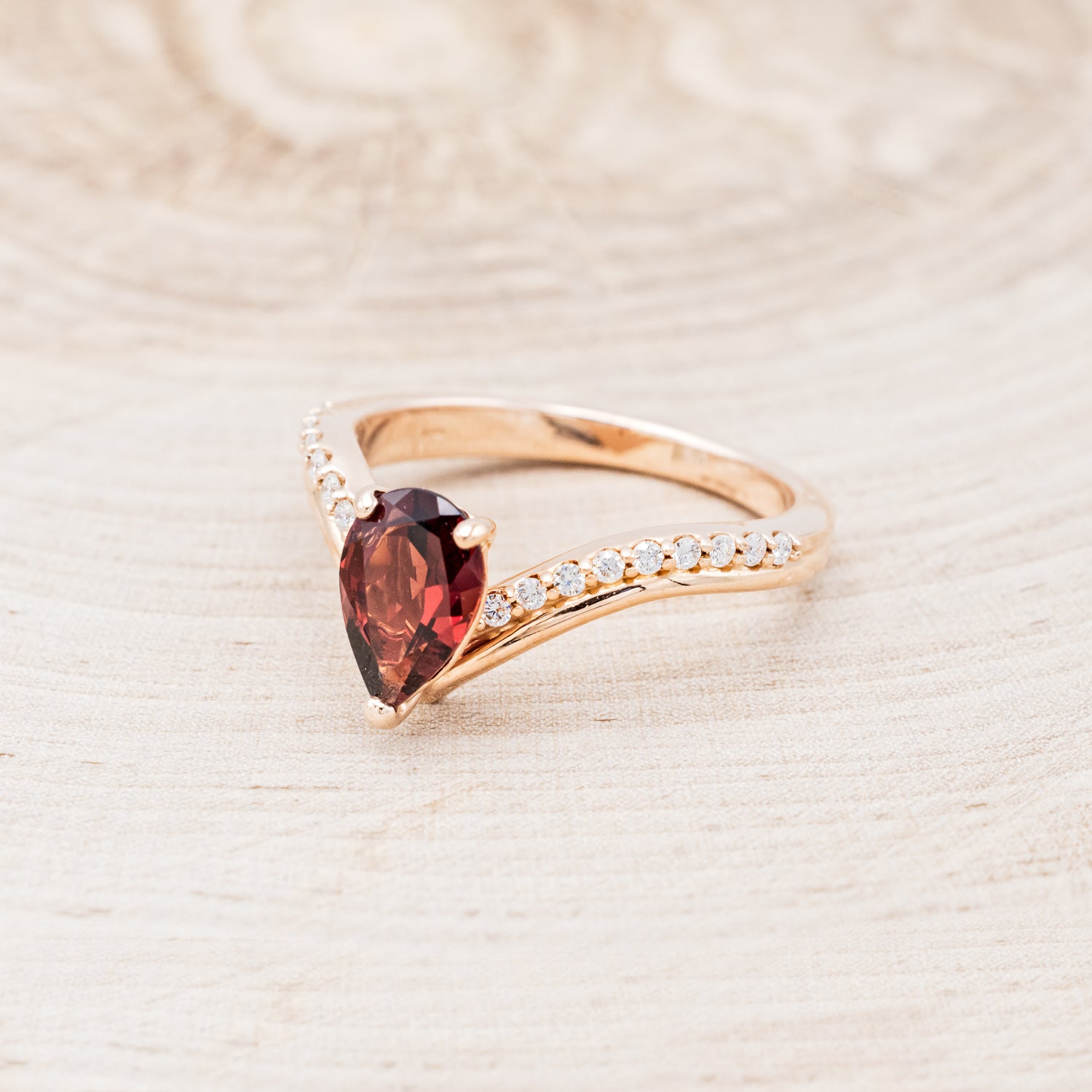 "IO" - PEAR-SHAPED GARNET ENGAGEMENT RING WITH DIAMOND ACCENTS-3