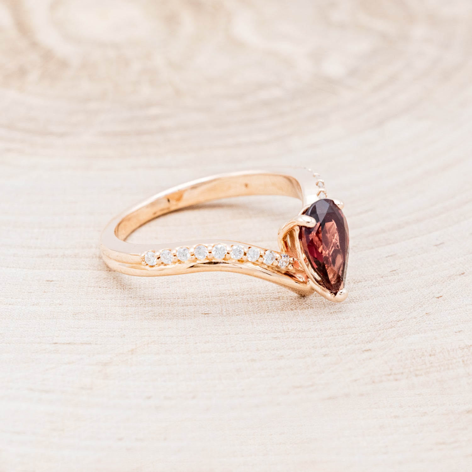 "IO" - PEAR-SHAPED GARNET ENGAGEMENT RING WITH DIAMOND ACCENTS-2
