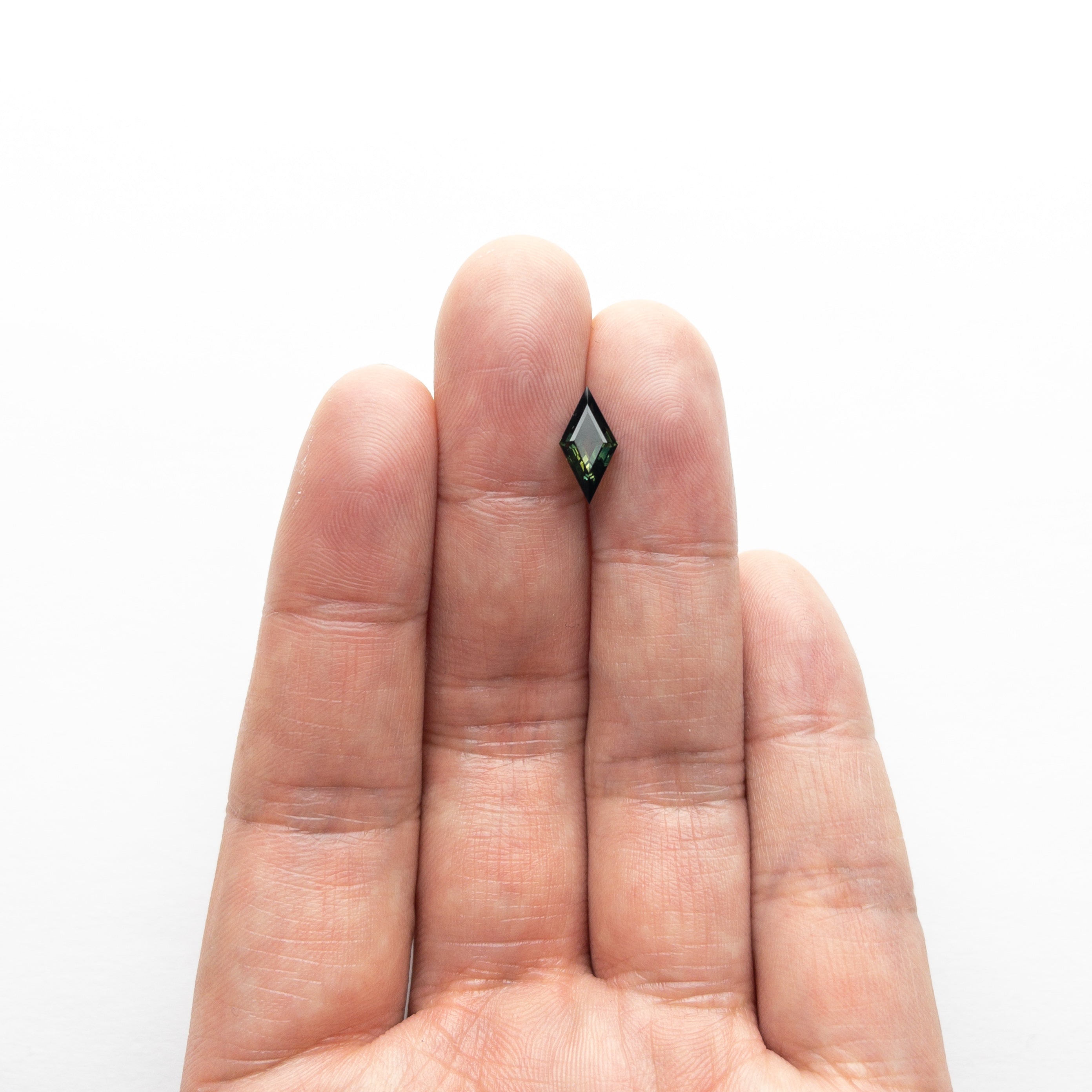 1.36ct 11.94x5.89x3.61mm Lozenge Step Cut Sapphire 22766-02-Staghead Designs