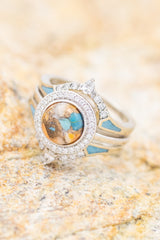 Shown here is The "Terra" bridal suite, a halo-style turquoise women's engagement ring  and two tracers with delicate and ornate details and is available with many center stone options.