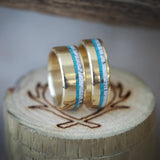 Shown here is A custom, handcrafted matching set of wedding rings featuring a hand-crushed turquoise and antler on gold bands. Additional inlay options are available upon request.-MATCHING 14K GOLD BANDS WITH TURQUOISE AND ANTLER INLAYS (available in 14K white, rose or yellow gold) - Staghead Designs - Antler Rings By Staghead Designs