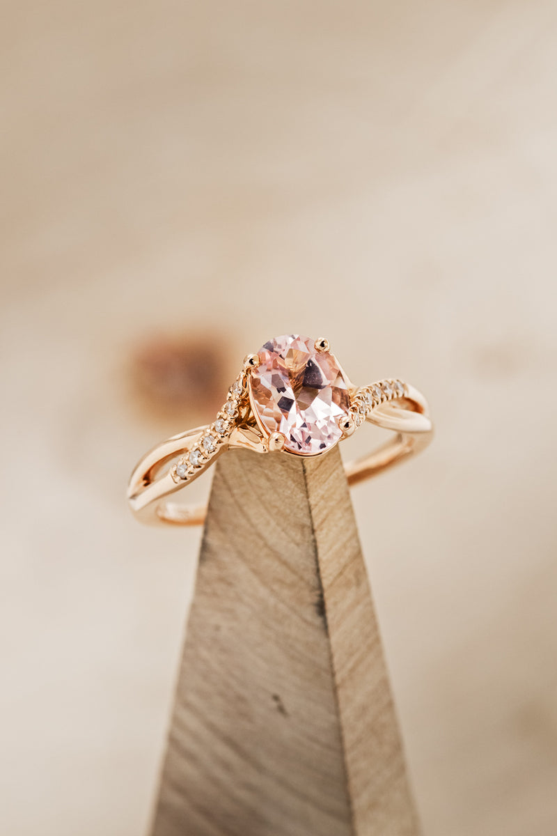 Shown here is  The "Roslyn", an oval morganite women's engagement ring with diamond accents and is available with many center stone options