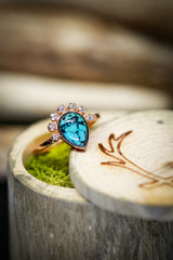 Shown here is An accented-style turquoise women's engagement ring with delicate and ornate details and is available with many center stone options-PEAR SHAPED TURQUOISE STONE WITH DIAMOND HALO ON 14K GOLD (available in 14K white, yellow & rose gold) - Staghead Designs - Antler Rings By Staghead Designs