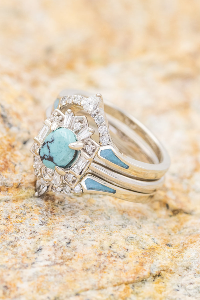 Shown here is The "Cleopatra", an art deco-style oval turquoise women's engagement ring with delicate and ornate details and is available with many center stone options