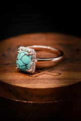 Shown here is  A halo-style turquoise women's engagement ring with delicate and ornate details and is available with many center stone options-Handmade Turquoise Engagement Ring with Diamonds - Staghead Designs