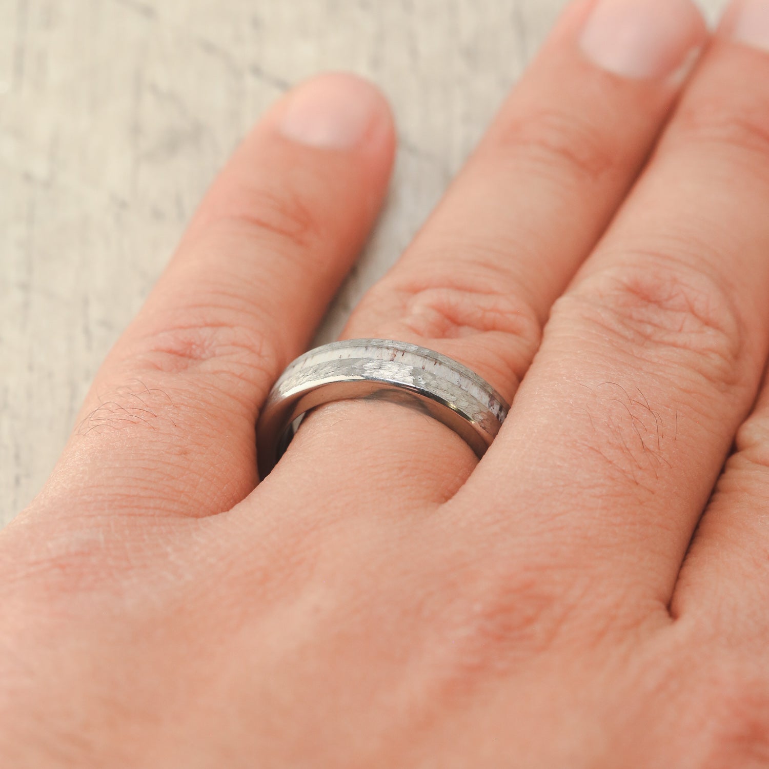 "VERTIGO" - ANTLER INLAY WEDDING RING FEATURING A WHISKEY BARREL LINING & HAMMERED FINISH-18