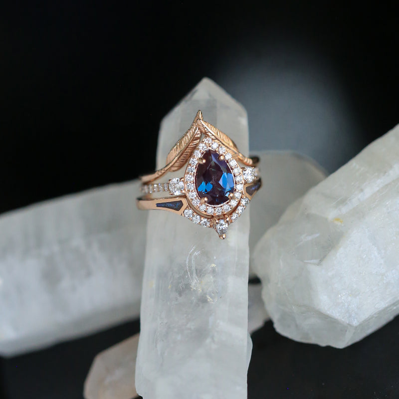 "CLARISS" - BRIDAL SUITE - PEAR SHAPED LAB-GROWN ALEXANDRITE ENGAGEMENT RING WITH DIAMOND HALO & TRACERS