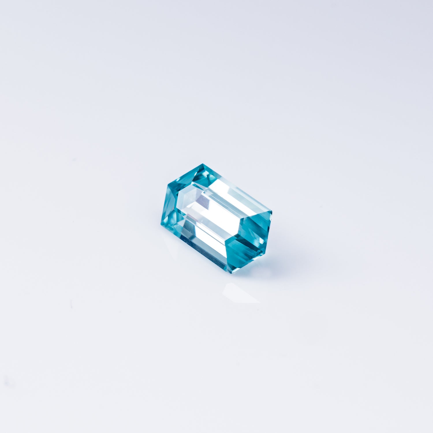 "HIKA" - ELONGATED HEXAGON-CUT BLUE ZIRCON-3