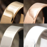 "SEDONA" - RAISED CENTER & HAMMERED EDGES WEDDING RING FEATURING A 14K GOLD LINED BAND