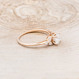 "BLOSSOM" - ROUND CUT MOISSANITE ENGAGEMENT RING WITH LEAF-SHAPED DIAMOND ACCENTS