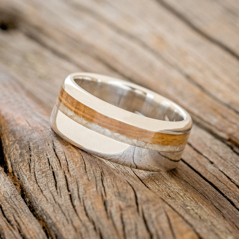 "CASTOR" - ELK TOOTH IVORY & WHISKEY BARREL OAK WEDDING RING FEATURING A DAMASCUS STEEL BAND