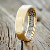 ANTLER LINED WEDDING RING FEATURING A HAMMERED 14K GOLD BAND