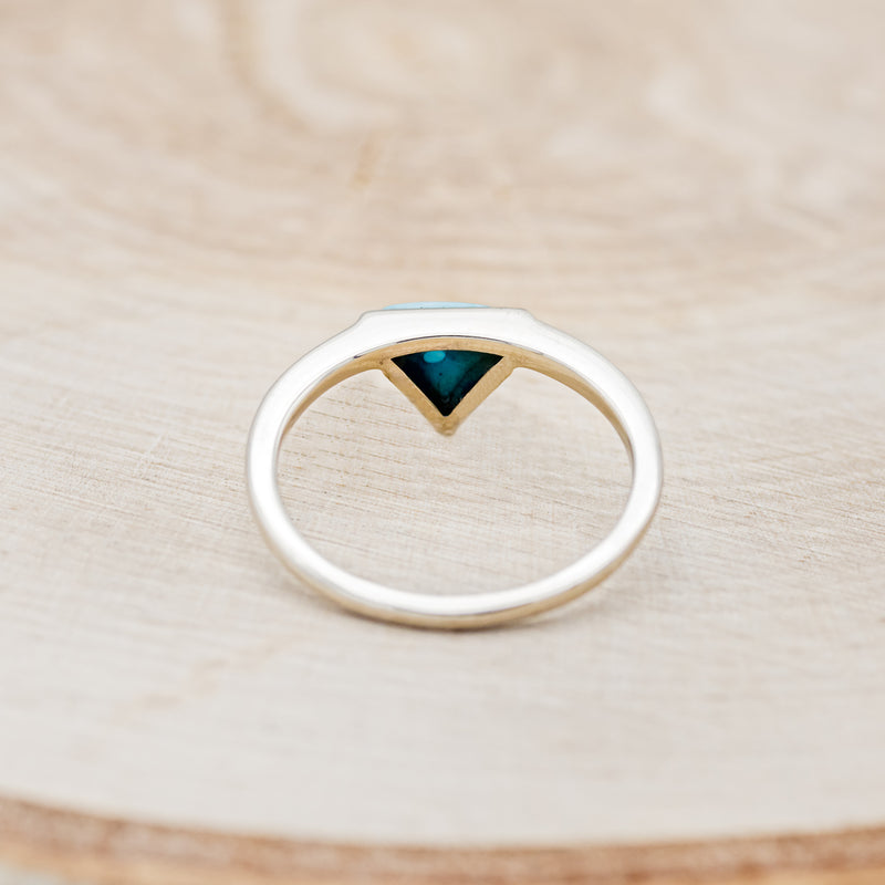 Shown here is "Jenny From The Block", a dainty-style triangle turquoise women's engagement ring, back view. Many other center stone options are available upon request.
