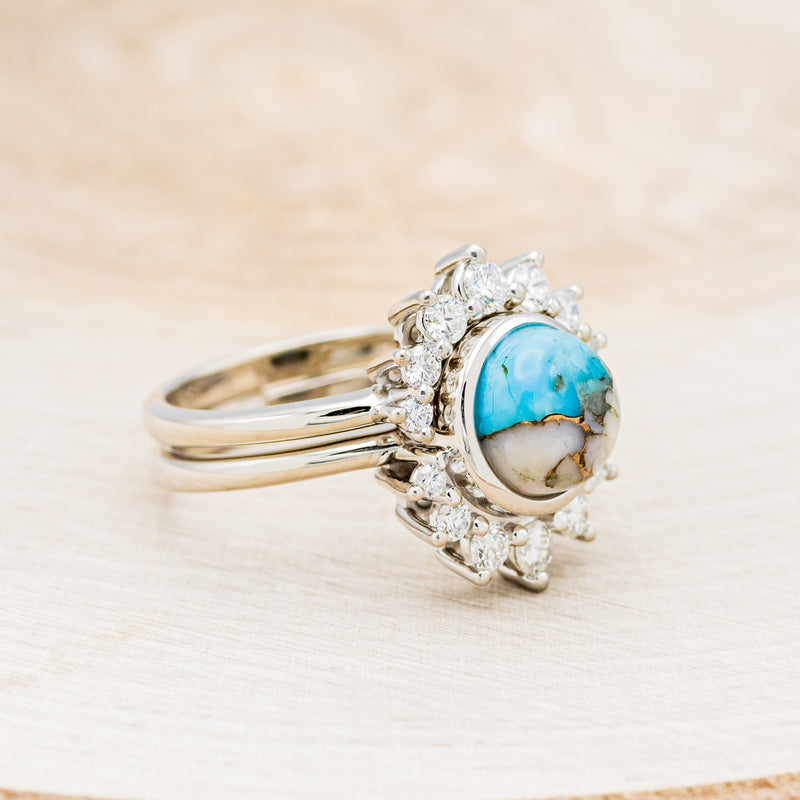 Shown here is "Esmeralda", a round cut spiny oyster turquoise women's engagement ring with diamond accents and a diamond tracer, facing right. Many other center stone options are available upon request.