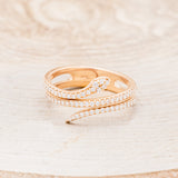 Shown here is "Eve", a snake-style stacking wedding band with diamond accents, front facing.