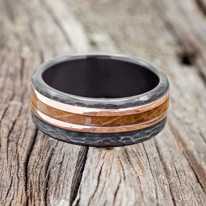 "TANNER" - WHISKEY BARREL OAK & 14K GOLD INLAYS WEDDING RING FEATURING A HAMMERED BLACK ZIRCONIUM BAND