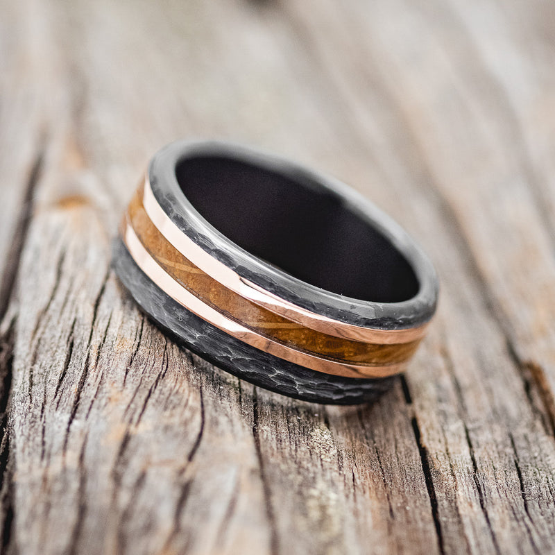 "TANNER" - WHISKEY BARREL OAK & 14K GOLD INLAYS WEDDING RING FEATURING A HAMMERED BLACK ZIRCONIUM BAND