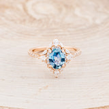 Shown here is The "North Star", a halo-style oval Montana sapphire women's engagement ring, facing front with delicate and ornate details and is available with many center stone options-Custom Engagement Ring - Vintage Style Engagement Ring - Staghead Designs