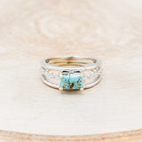 Shown here is "Dolly", a turquoise women's engagement ring with diamond accents, front facing. Many other center stone options are available upon request.