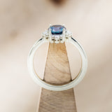 "HALLEY" - ROUND CUT LAB-GROWN ALEXANDRITE ENGAGEMENT RING WITH A DIAMOND HALO