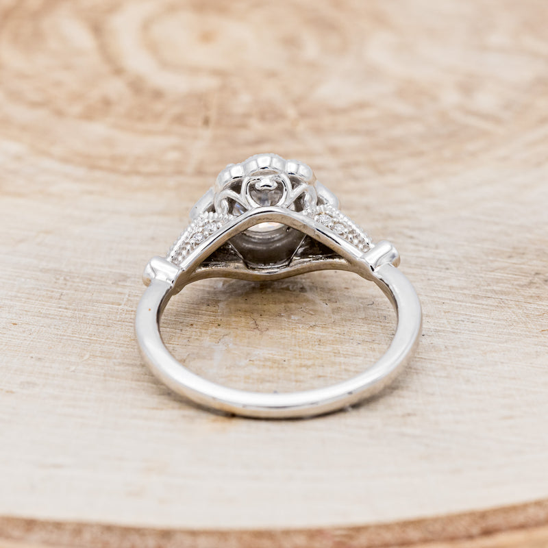 Shown here is "Eileen", a vintage-style moissanite women's engagement ring with diamond accents, back view. Many other center stone options are available upon request.