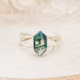 Shown here is "Artemis", an antler/branch-style moss agate women's engagement ring, front facing. Many other center stone options are available upon request.