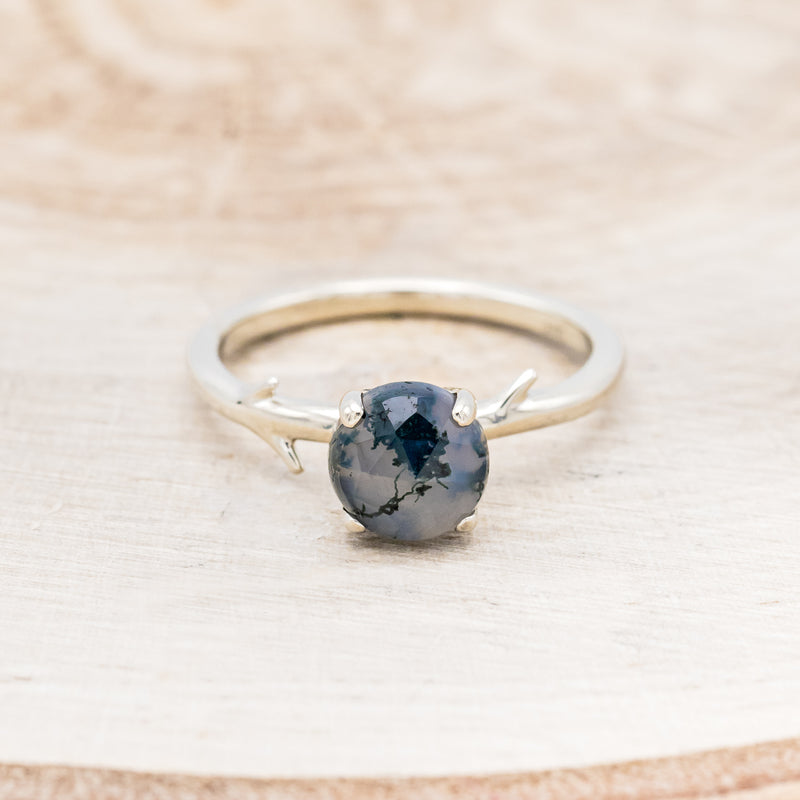 Shown here is "Artemis", an antler/branch-style round cut moss agate women's engagement ring, front facing. Many other center stone options are available upon request.