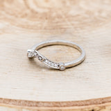 Shown here is "Eileen" tracer, a vintage-style diamond accent band, facing left. Many other center stone options are available upon request.
