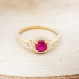 "CYRA" - CUSHION CUT LAB-GROWN RUBY ENGAGEMENT RING WITH DIAMOND HALO & ACCENTS