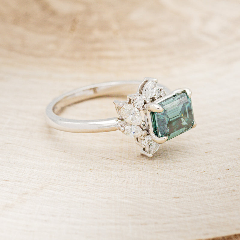"AURAE" - EMERALD CUT MEDEINA GREEN MOISSANITE ENGAGEMENT RING WITH DIAMOND ACCENTS