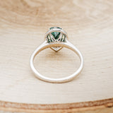 "CLARISS" - PEAR-SHAPED MEDEINA GREEN MOISSANITE ENGAGEMENT RING WITH DIAMOND HALO