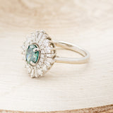 "TALA" - OVAL MEDEINA GREEN MOISSANITE ENGAGEMENT RING WITH DIAMOND ACCENTS