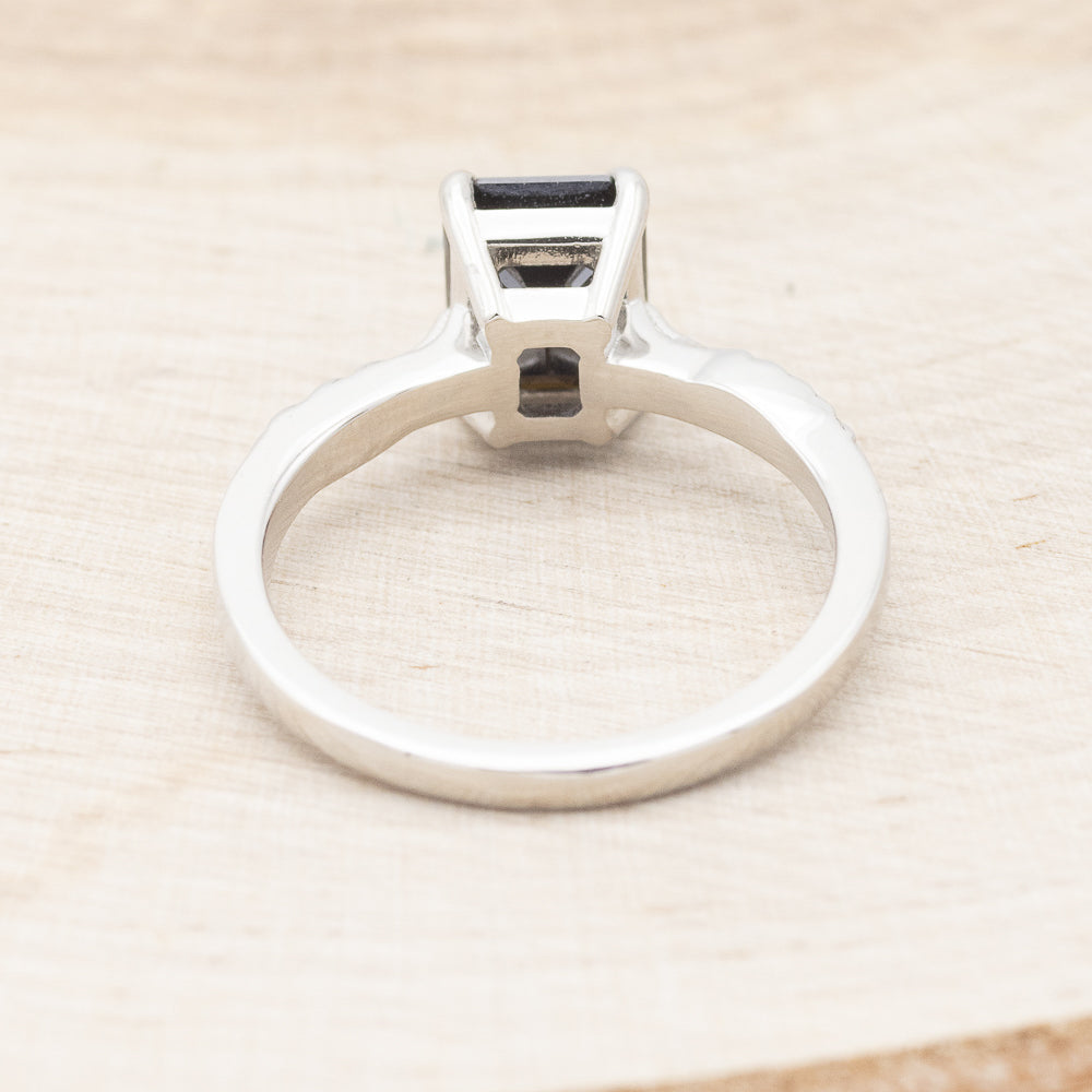 "HOPE" - EMERALD CUT MIDNIGHT BLACK MOISSANITE SOLITAIRE ENGAGEMENT RING WITH FEATHER ACCENTS-6