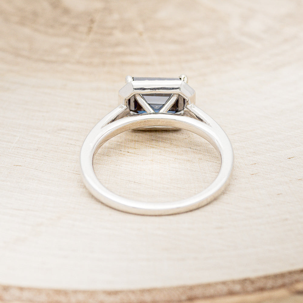 "CYBELE" - EMERALD CUT ACTAEON BLUE MOISSANITE ENGAGEMENT RING WITH DIAMOND HALO-6