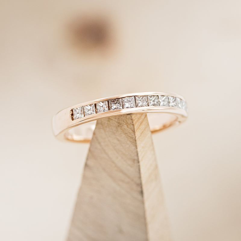Shown here is The "Lana" , a custom cast stacking band with diamonds.