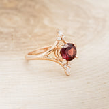 "CALLIE" - ROUND CUT GARNET ENGAGEMENT RING WITH DIAMOND ACCENTS