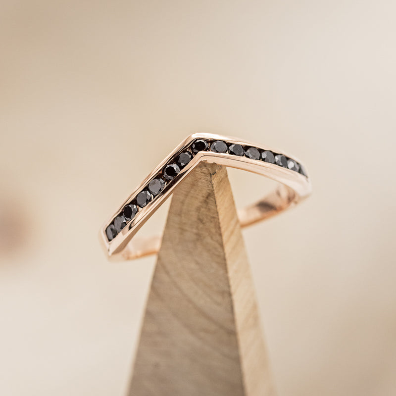 Shown here is The "Cara" Tracer", a black diamond-accented wedding band that is made to go with some of our engagement rings (email for options)