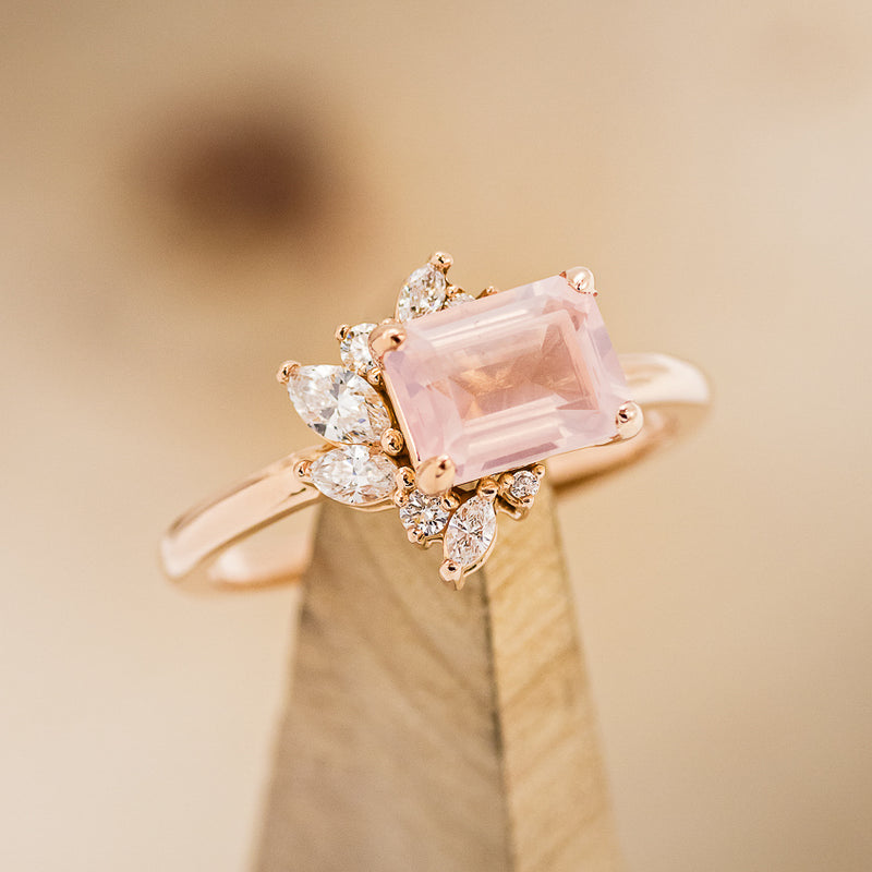 Shown here is The "Aurae", an Art Deco-style rose quartz women's engagement ring with delicate and ornate details and is available with many center stone options