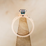 "HOPE" - ROUND CUT LAB-GROWN ALEXANDRITE SOLITAIRE ENGAGEMENT RING WITH FEATHER ACCENTS