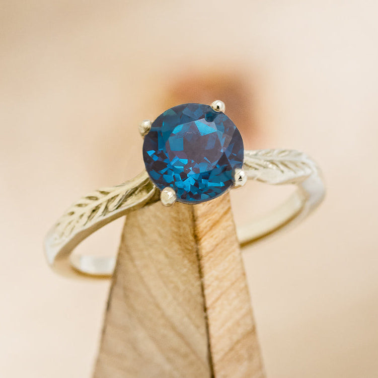 "HOPE" - ROUND CUT LAB-GROWN ALEXANDRITE SOLITAIRE ENGAGEMENT RING WITH FEATHER ACCENTS-7