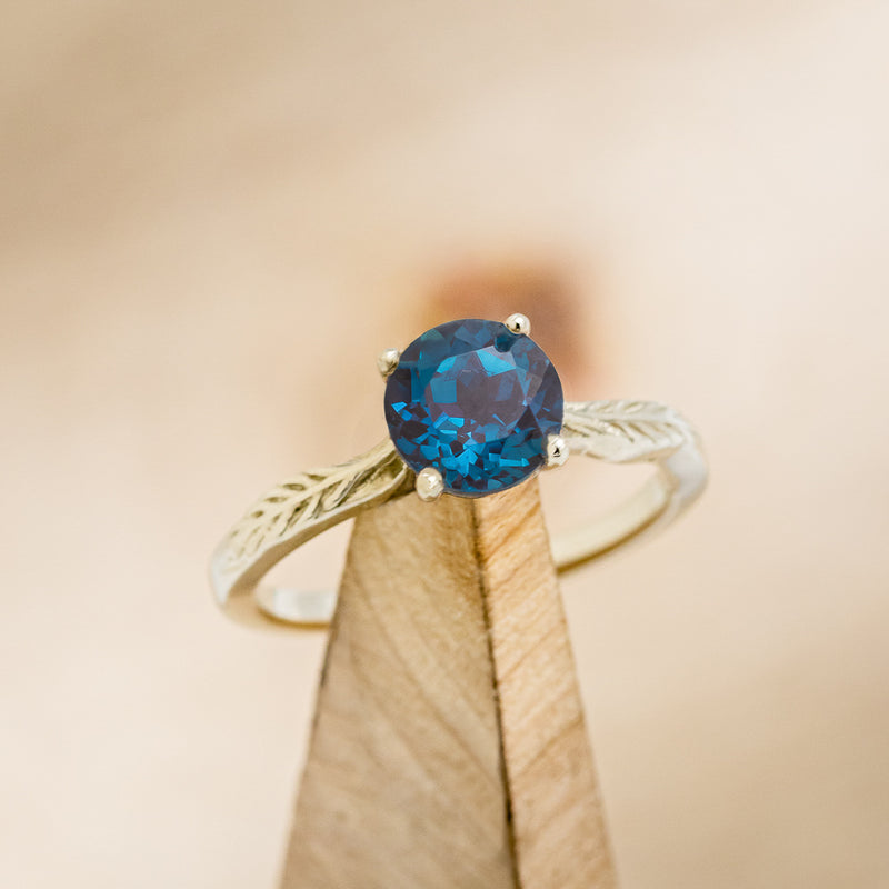 "HOPE" - ROUND CUT LAB-GROWN ALEXANDRITE SOLITAIRE ENGAGEMENT RING WITH FEATHER ACCENTS