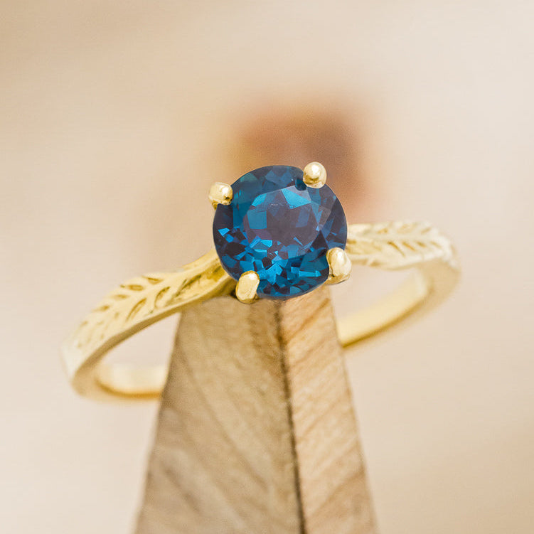 "HOPE" - ROUND CUT LAB-GROWN ALEXANDRITE SOLITAIRE ENGAGEMENT RING WITH FEATHER ACCENTS-8