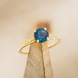 "HOPE" - ROUND LAB-GROWN ALEXANDRITE SOLITAIRE ENGAGEMENT RING WITH FEATHER ACCENT DETAILS - READY TO SHIP