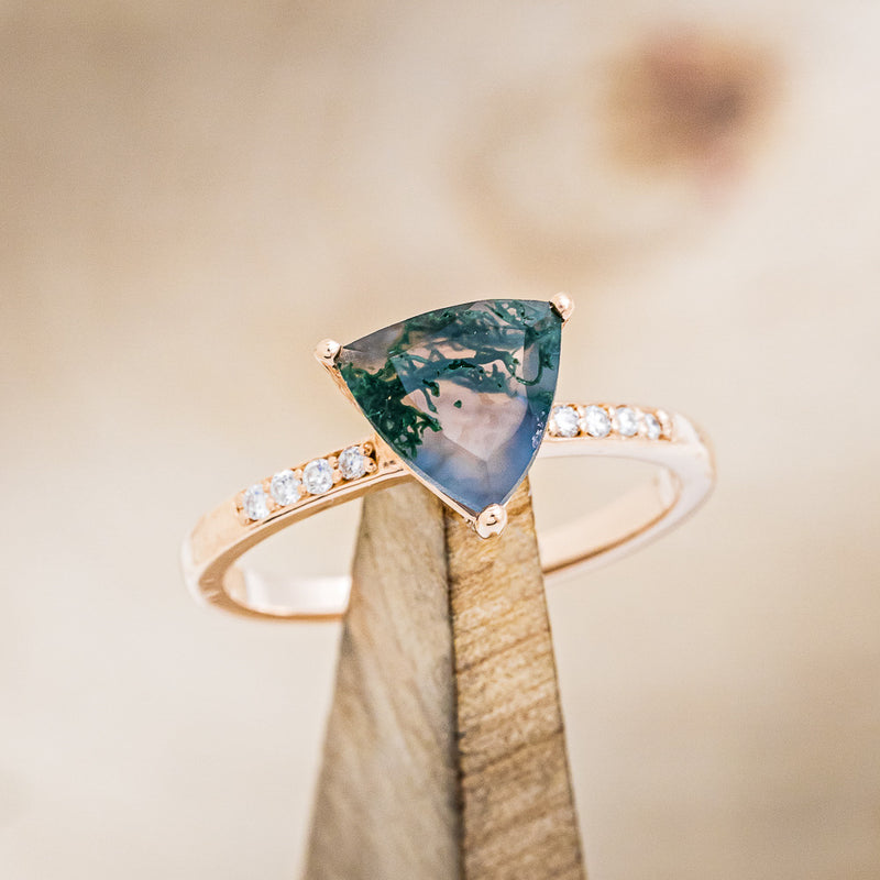 Shown here is "Piper",  a moss agate women's engagement ring with diamond accents, design is shown on stand front facing. Many other center stone options are available upon request. 