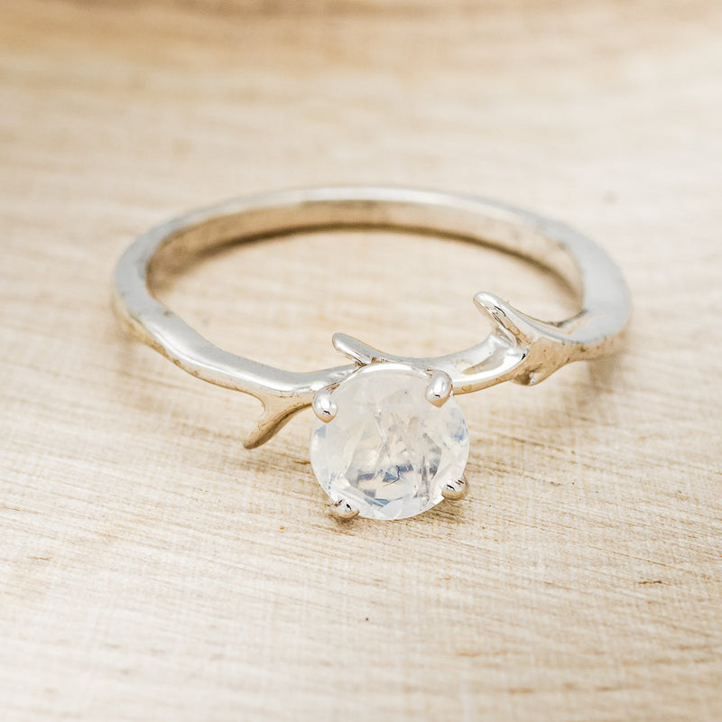 Shown here is "Artemis", an antler/branch-style round cut moonstone women's engagement ring, front facing. Many other center stone options are available upon request.