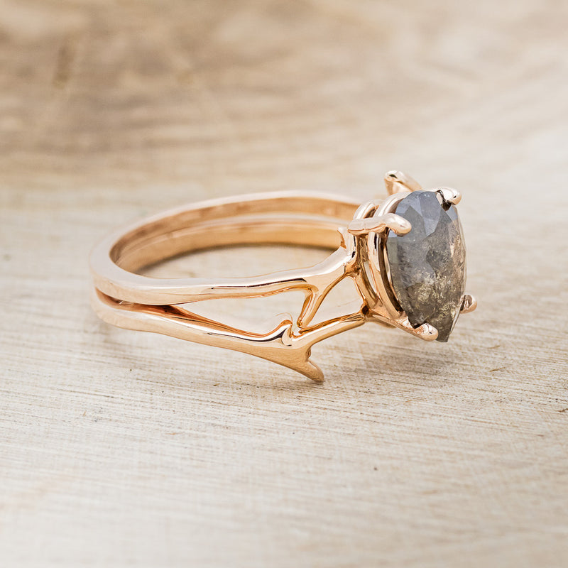 Shown here is "Artemis", a women's engagement ring with an antler-style stacking band displayed here with a pear-shaped salt and pepper diamond but listed here as a mounting-only option,  facing right. Follow the instructions above to select your stone.