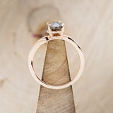 Shown here is "Artemis", a women's engagement ring with an antler-style band displayed here with a pear-shaped salt and pepper diamond but listed here as a mounting-only option, side view on stand. Follow the instructions above to select your stone.