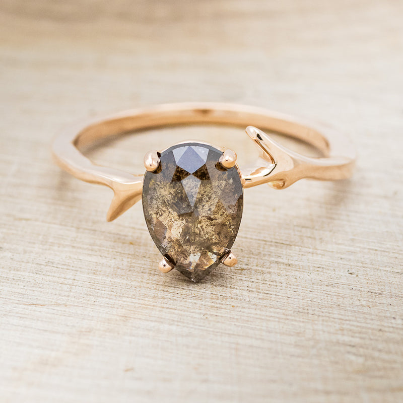 Shown here is "Artemis", a women's engagement ring with an antler-style band displayed here with a pear-shaped salt and pepper diamond but listed here as a mounting-only option, front facing. Follow the instructions above to select your stone.
